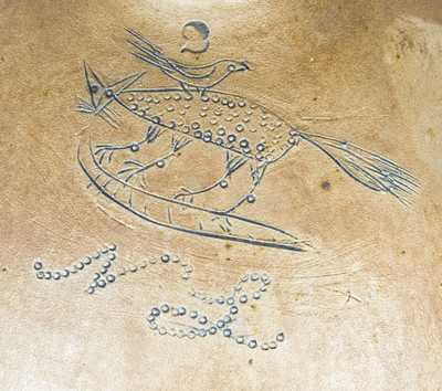 Early Stoneware Jug with Incised Fox and Bird Decoration