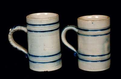 Lot of Two: Molded Stoneware Mugs Signed "JOHN WYGAND / NEW YORK"