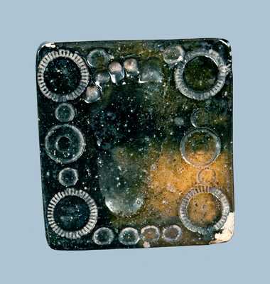 Redware Tile with Baby