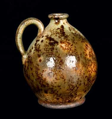 Ovoid Redware Jug, Green with Brown Sponging