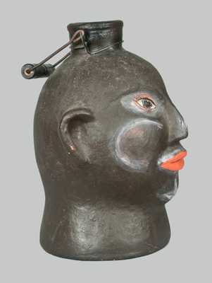 Unusual Cold-Painted Face Jug