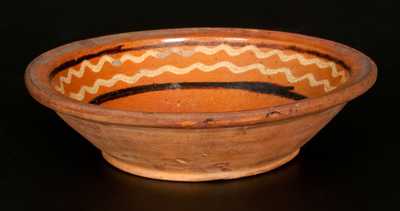 Redware Bowl with Yellow and Brown Slip-Decorated Interior