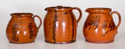 Lot of Three: Redware Batter Pitchers with Manganese Decoration