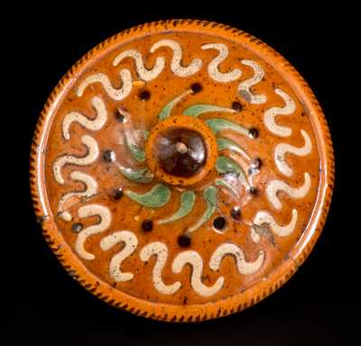 Exceptional Pennsylvania Redware Lid with Elaborate Slip Decoration
