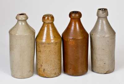 Lot of Four: Stoneware Bottles w/ Impressed Advertising incl. Two Dated Examples