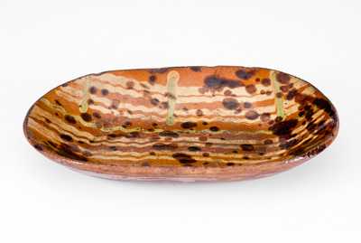 Very Fine Small-Sized Redware Loaf Dish with Three-Color Slip Decoration
