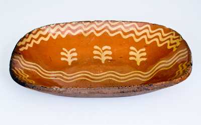 Fine Slip-Decorated Redware Loaf Dish, Philadelphia, PA origin, circa 1825