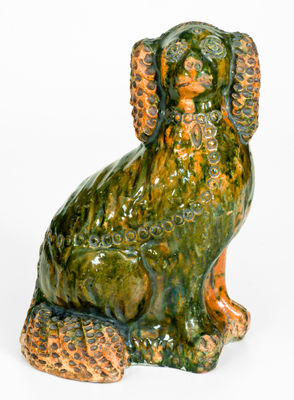 S. BELL & SON / STRASBURG, Virginia Copper-Glazed Redware Figure of a Spaniel