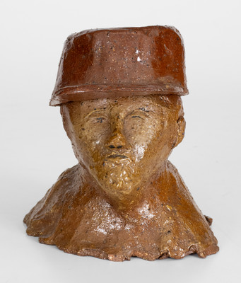 Rare Two-Piece Sewer Tile Bust Sculpture of a Hatted Man, probably Ohio, late 19th / early 20th century