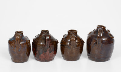 Lot of Four: Small-Sized Marie Rogers Face Jugs