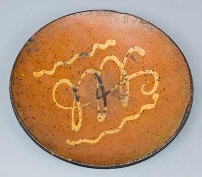 Slip-Decorated Redware Charger, PA or New England origin.
