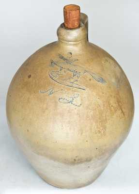 Early Stoneware Jug with Incised Fox and Bird Decoration