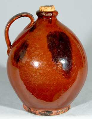 Glazed Redware Jug, New England origin.