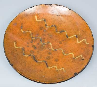 Slip-Decorated Redware Charger, PA or New England origin.