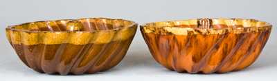 Two Glazed Redware Turk s Head Molds.
