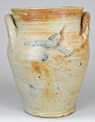 Early Stoneware Jar with Elephant Decoration.