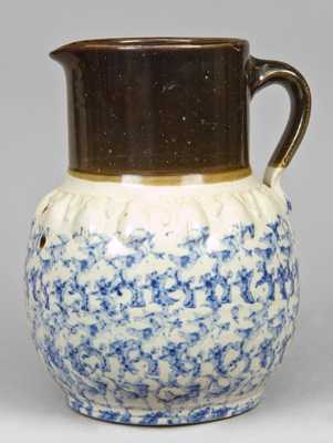 Sponge and Albany Slip Moulded Pitcher