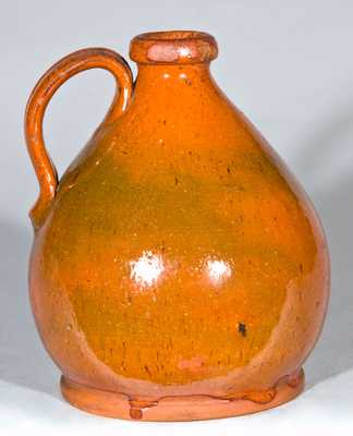 Small Glazed Redware Jug, probably New England origin