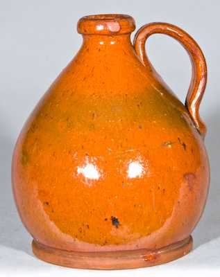 Small Glazed Redware Jug, probably New England origin