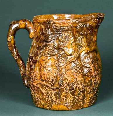 Molded Redware Pitcher with Relief Grape Design