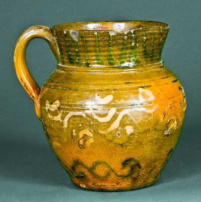 Early Redware Pitcher with Multi-Colored Slip Decoration