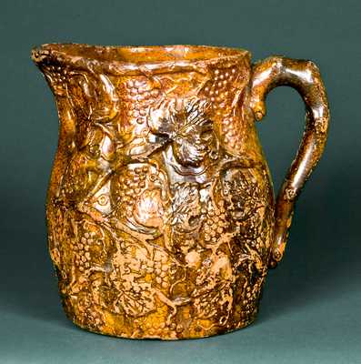 Molded Redware Pitcher with Relief Grape Design