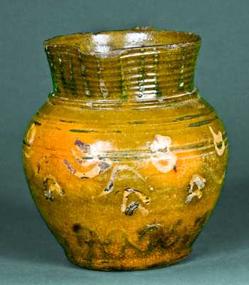 Early Redware Pitcher with Multi-Colored Slip Decoration