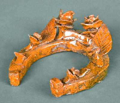 Redware Horseshoe with applied flowers