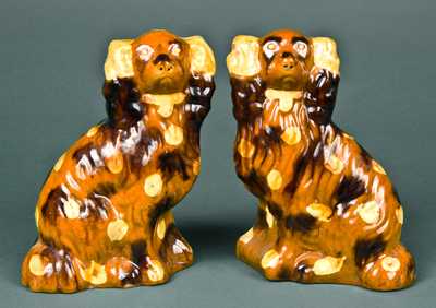 Pair of Redware Spaniels, probably Pennsylvania