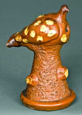 Slip-Decorated Redware Bird-on-Stump Whistle, probably PA