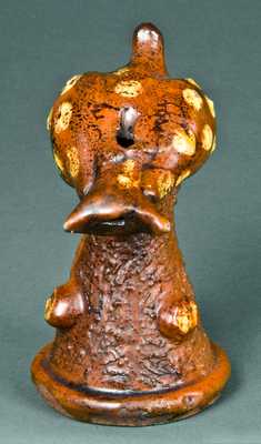 Slip-Decorated Redware Bird-on-Stump Whistle, probably PA