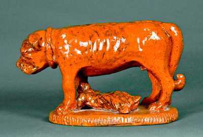 Redware Figure of a Dog Guarding a Baby
