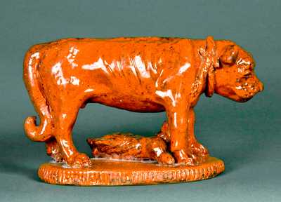 Redware Figure of a Dog Guarding a Baby