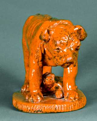 Redware Figure of a Dog Guarding a Baby