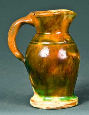 Miniature Strasburg, VA Multi-Glazed Redware Pitcher