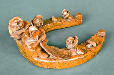 Redware Horseshoe with applied flowers