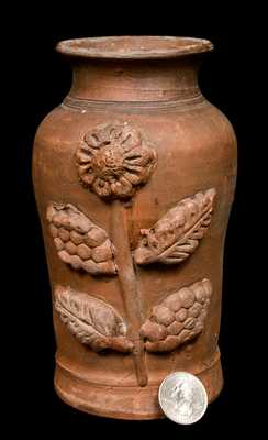 Redware Vase with Applied Floral Decoration.