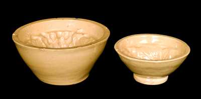 Two Yellowware Grape Molds