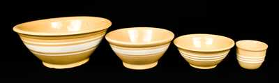 Lot of Four: Yellowware Banded Bowls