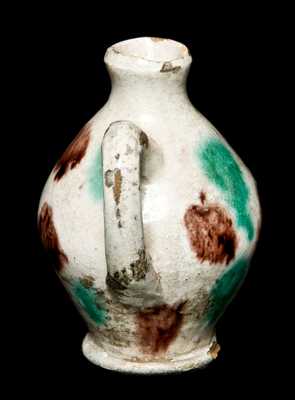 Miniature Redware Jug with Multi-Colored Glaze