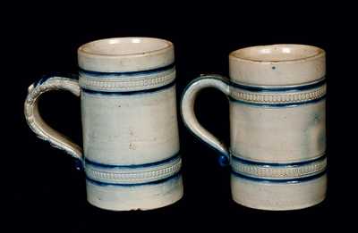 Lot of Two: Molded Stoneware Mugs Signed 