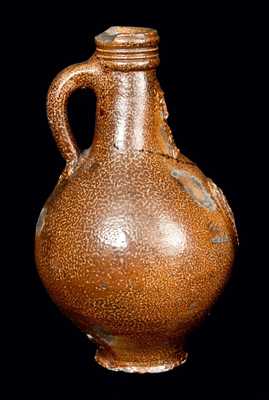 Bellarmine Stoneware Jug with Bearded Man and Floral Medallion