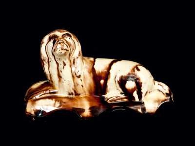 English Redware Reclining Dog Figure