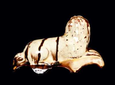 English Redware Reclining Dog Figure