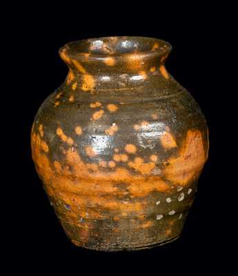 Ovoid Redware Jar with Orange Splotches