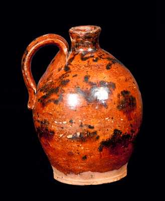 Ovoid Redware Jug with Manganese Splotches