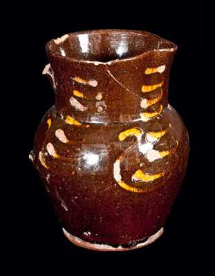 Redware Pitcher with Slip Swan Decoration