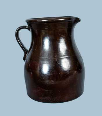 E. NORTON & CO. / BENNINGTON, VT.Albany-Slip Stoneware Pitcher