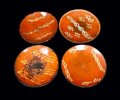 Lot of Four: Slip-Decorated Redware Plates