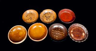 Lot of Seven: Utilitarian Dishes, Including One Slip-Decorated Redware Example